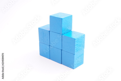 Blue wooden blocks on white background. 
