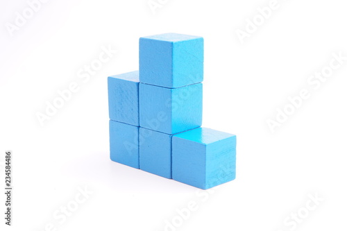 Blue wooden blocks on white background. 