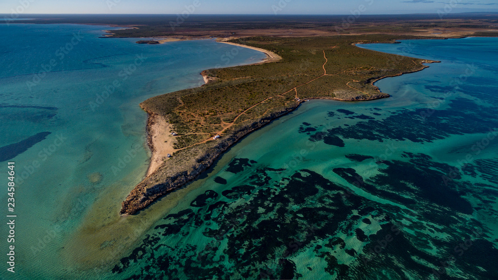 Oblique aerial drone view of seagrass meadows and headlands in the World Heritage Listed Shark Bay Conservation Area.