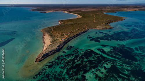 Oblique aerial drone view of seagrass meadows and headlands in the World Heritage Listed Shark Bay Conservation Area.