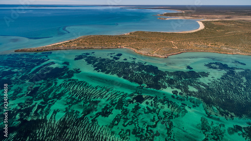 Fotografie Oblique aerial drone view of seagrass meadows and headlands in the World Heritage Listed Shark Bay Conservation Area