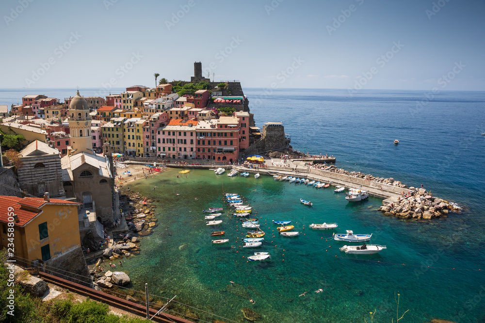 The stunning Cinque Terre town and harbour of Vernazza, as seen from the famous hiking trail