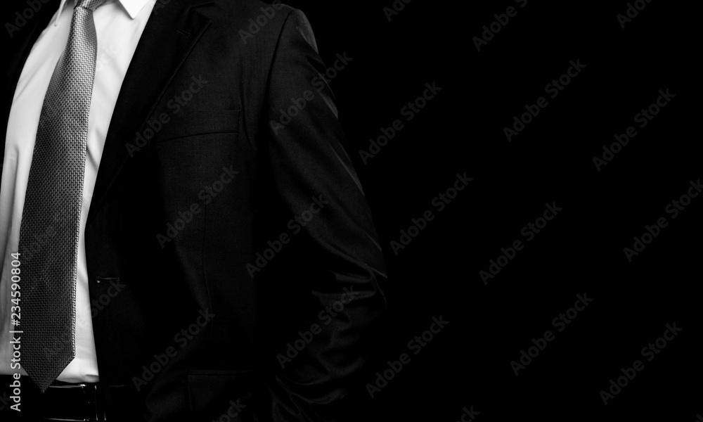 Businessman with hand watch on background, close-up Businessman with hand watch on background, close-up