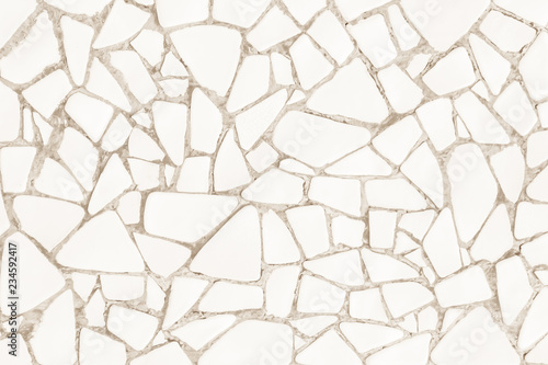 Broken tiles mosaic seamless pattern. White and Cream tile real wall high resolution real photo or brick seamless with texture interior background. Abstract wallpaper irregular in bathroom.
