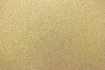 Sparkling macro gold glitter bokeh abstract background