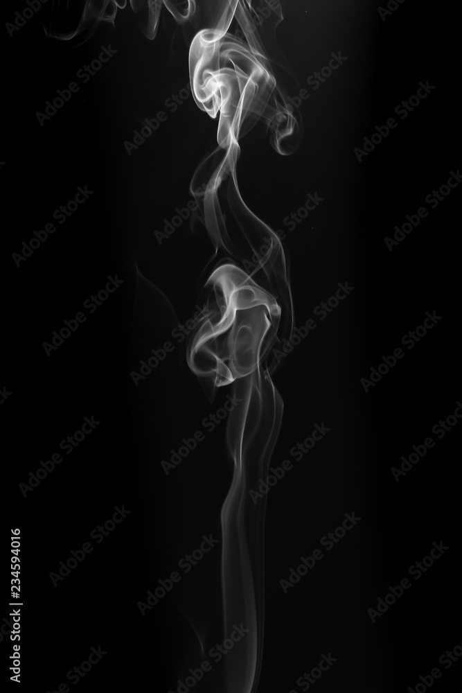 Movement of white smoke on black background