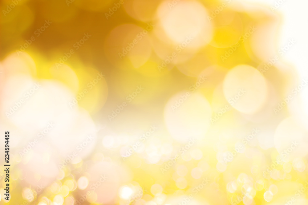 Abstract glamorous white silver and gold bokeh lights glitter sparkle. Defocused background have luxury golden color party invite for birthday, anniversary, holliday, new year’s eve or Christmas. Abstract glamorous white silver and gold bokeh lights glitter sparkle. Defocused background have luxury golden color party invite for birthday, anniversary, holliday, new year’s eve or Christmas.