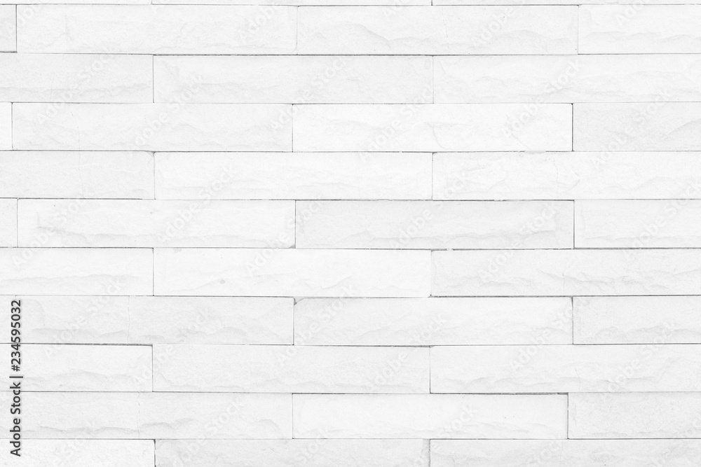 Seamless Grey pattern of decorative brick sandstone wall surface with concrete of modern style design decorative uneven have cracked realmasonry wall of multicolored stones or blocks with cement. Seamless Grey pattern of decorative brick sandstone wall surface with concrete of modern style design decorative uneven have cracked realmasonry wall of multicolored stones or blocks with cement.