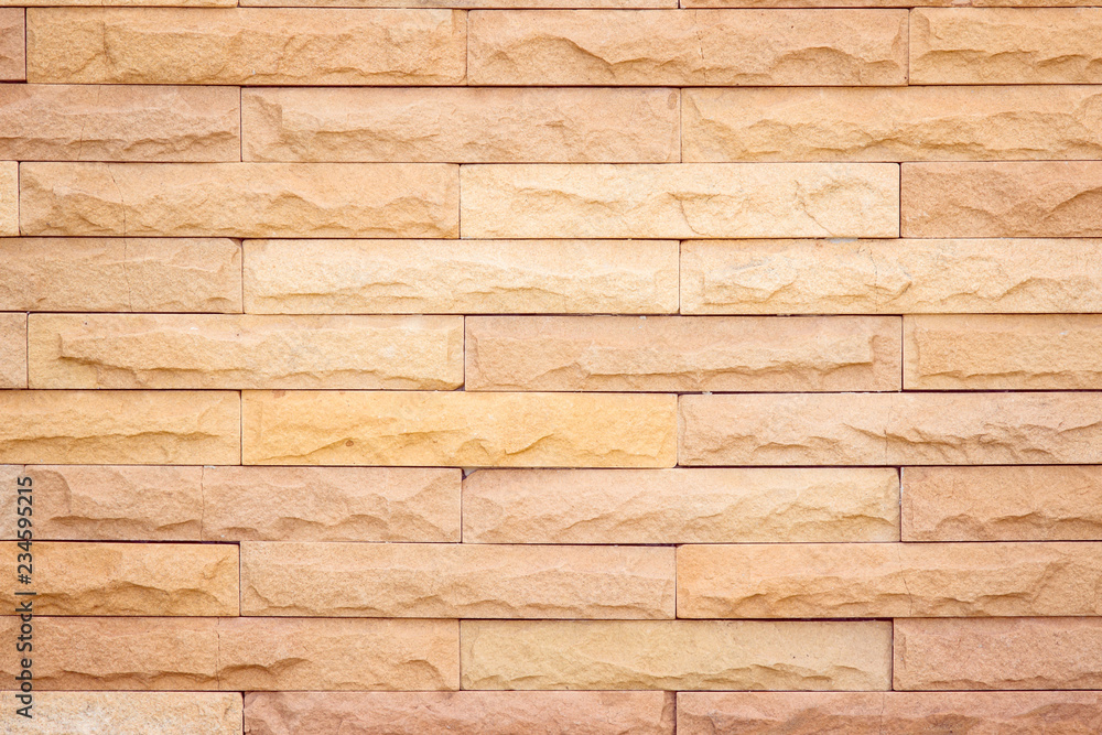 Seamless Grey pattern of decorative brick sandstone wall surface with concrete of modern style design decorative uneven have cracked realmasonry wall of multicolored stones or blocks with cement. Seamless Grey pattern of decorative brick sandstone wall surface with concrete of modern style design decorative uneven have cracked realmasonry wall of multicolored stones or blocks with cement.