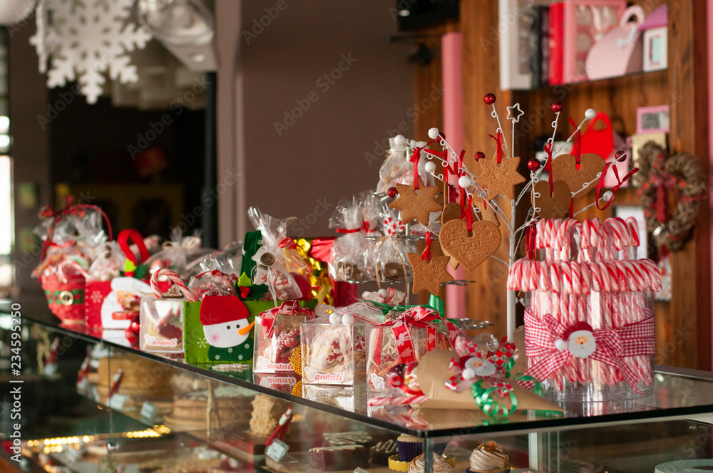 Christmas and New year gifts and baskets with sweets, alcohol, chocolate and cookies Christmas and New year gifts and baskets with sweets, alcohol, chocolate and cookies