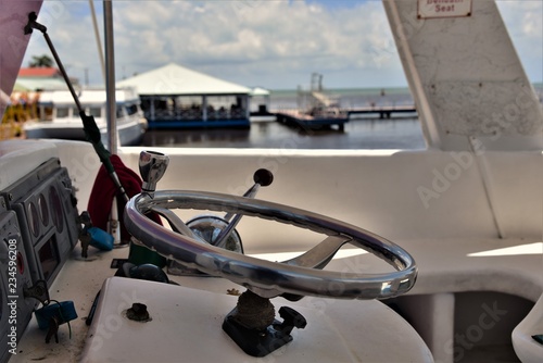 Steering wheel of tourist boat in belize