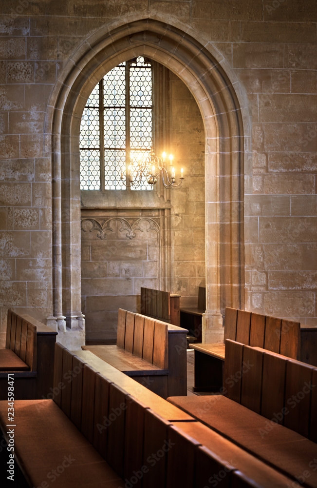 Arched entrance to the side chapel and benches. in Severin church in Erfurt Arched entrance to the side chapel and benches. in Severin church in Erfurt