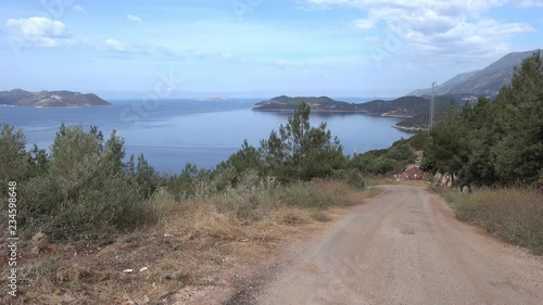 4K Country road downhill to the sea photo