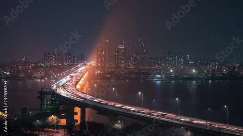 4K Timelapse Sequence of Seoul, Korea - Wide angle view of the Cheongdam Bridge at Night in Seoul photo