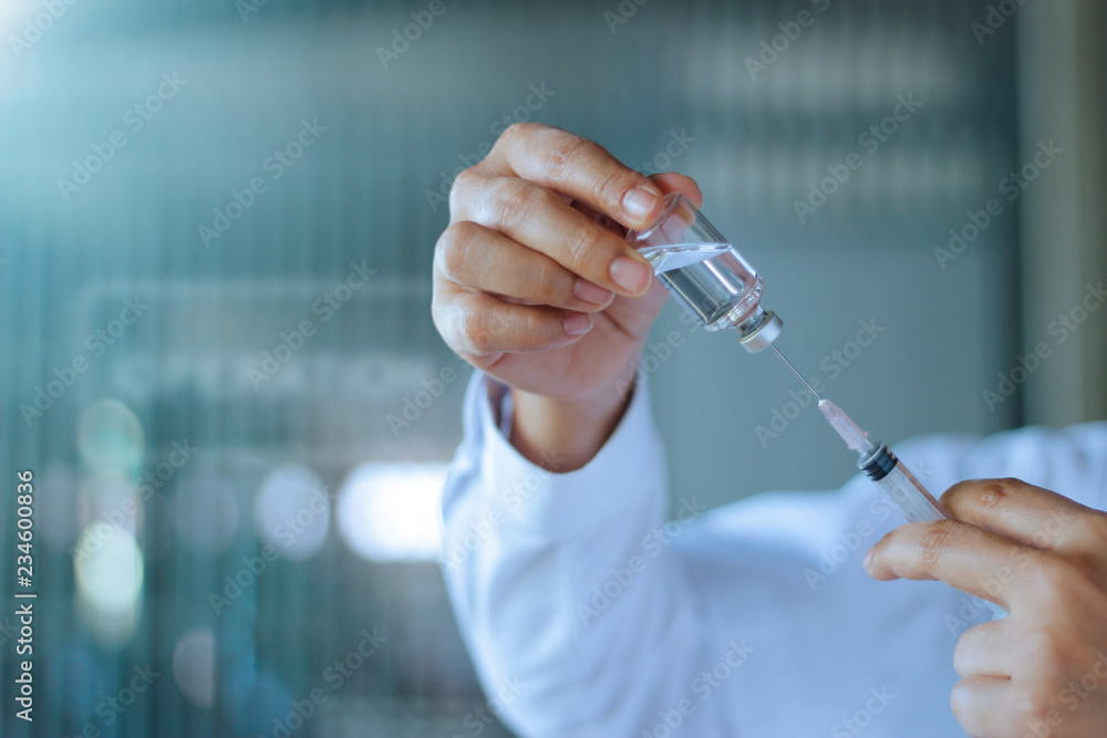 Medicine doctor and vaccine dose flu shot drug syringe in laboratory, microbiology and pharmaceutical research, medical and healthcare.