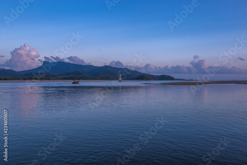 Sea background, vivid blue wallpaper, natural scenery (mountains, fishing boats), a common habitat between people and nature.