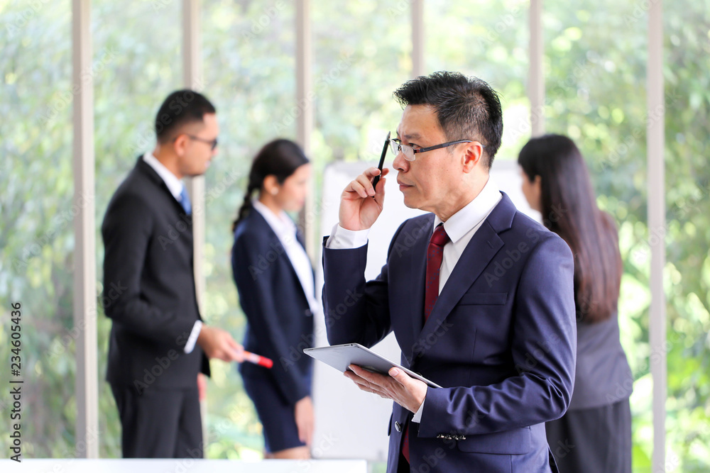 Senior business man asia with Business Group Meeting Discussion Strategy Working Concept. Senior business man asia with Business Group Meeting Discussion Strategy Working Concept.