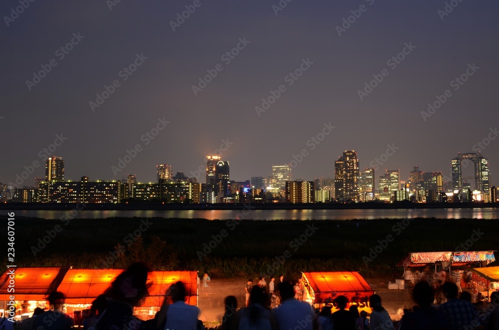 淀川花火大会の屋台と梅田ビル群stock Photo Adobe Stock