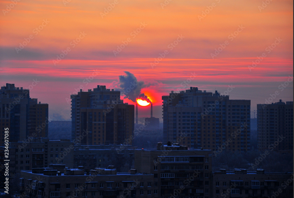Sun rise in the city Winter morning Smog