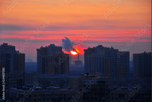 Sun rise in the city Winter morning Smog