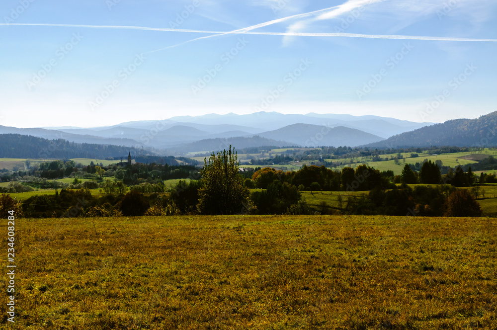 Obraz premium Bieszczady Mountains, Lutowiska, Poland. View from viewpoint near Lutowiska town in sunny day.
