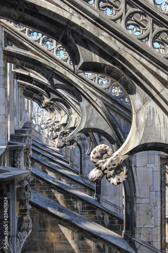 Stone lace./ Top part of the Gothic cathedral is decorated with stone carvings.