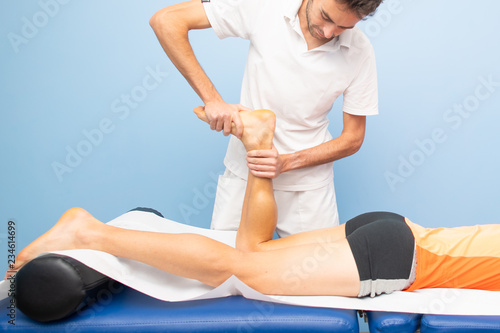 Physiotherapy practice tibio-tarsal mobilization to an athlete