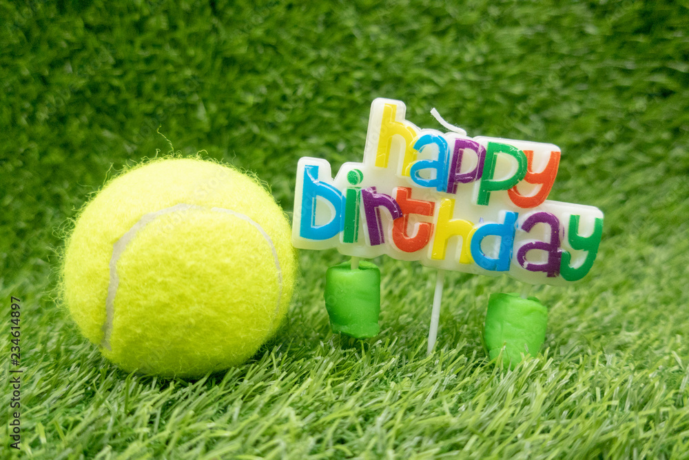 Happy Birthday to tennis player with tennis ball and sign on green grass  Stock Photo | Adobe Stock