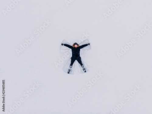 top view snow angel man in december