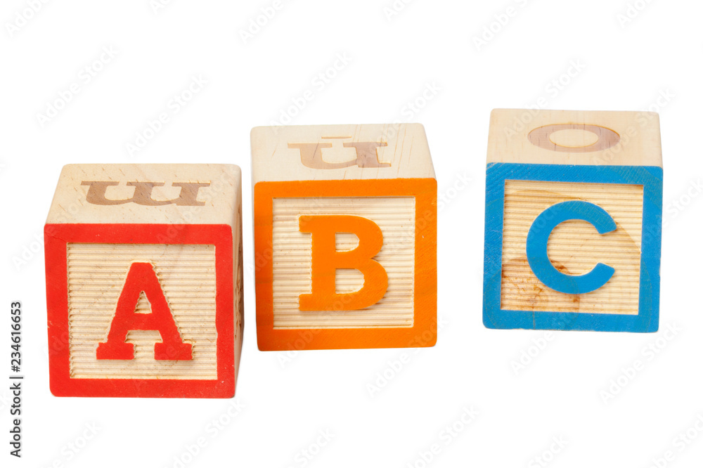 Wooden alphabet blocks isolated on white background Wooden alphabet blocks isolated on white background