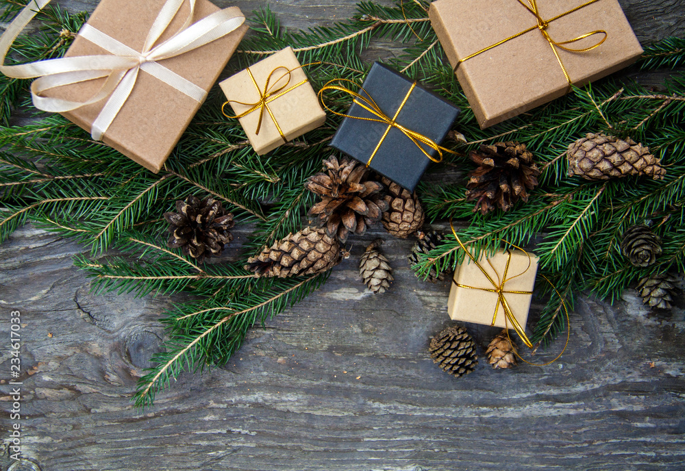 Christmas gift boxes on a rustic wooden background Christmas gift boxes on a rustic wooden background