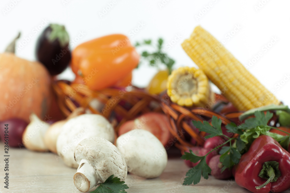 mushrooms on a background of fresh vegetables. mushrooms on a background of fresh vegetables.