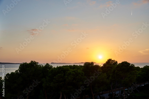 Balearic sunset from La Savina in Formentera with Es Vedra of Ibiza in background