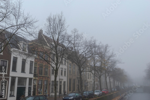 Canal houses in the mist. Oosthaven Gouda  The Netherlands.
