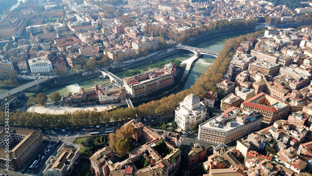 Obraz premium Aerial drone photo of famous Tiber river Island or Isola Tiberina in city of Rome, Italy