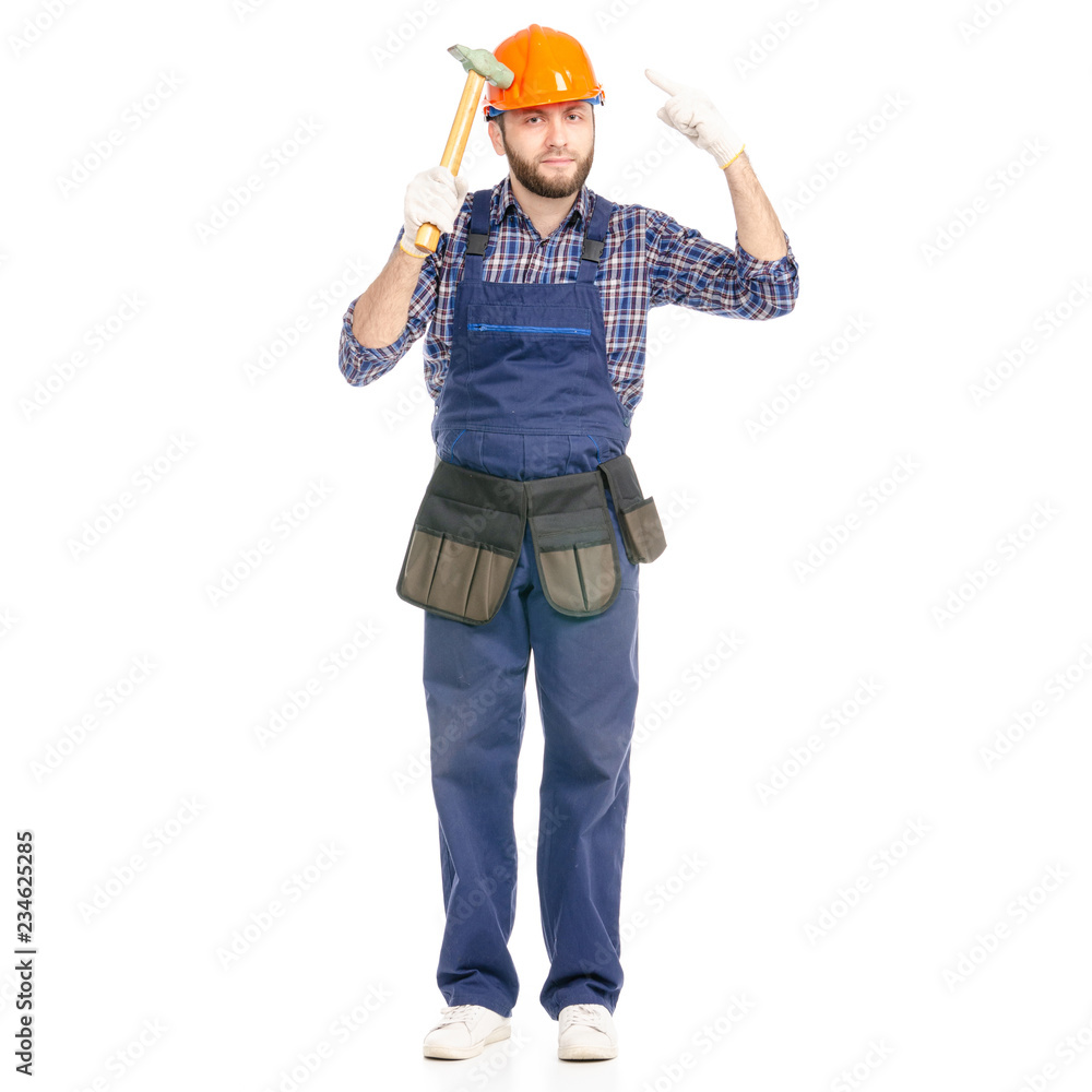 Young man builder industry worker with a hammer on white background isolation Young man builder industry worker with a hammer on white background isolation