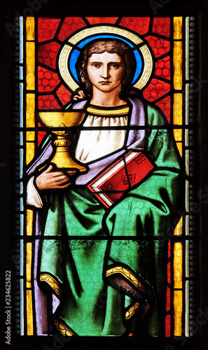 Saint John the Evangelist, stained glass window in parish church of Saint Mark in Zagreb, Croatia 