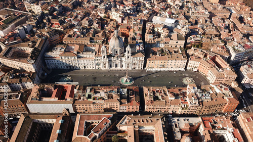 Photography Aerial drone view of iconic landmark Piazza Navona Square featuring Fountain of