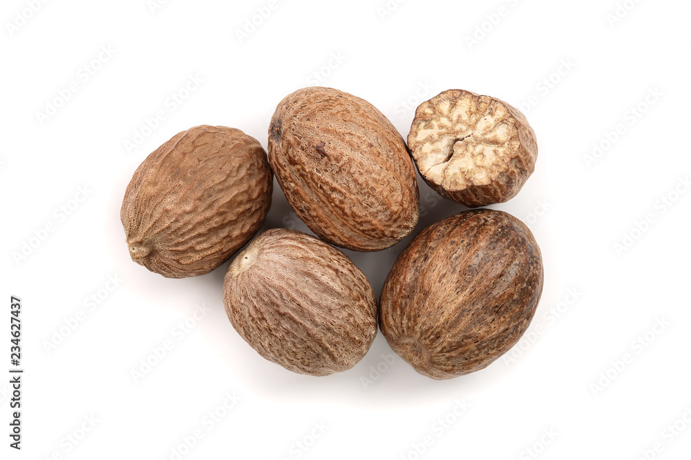 Nutmeg isolated on white background. Top view Nutmeg isolated on white background. Top view