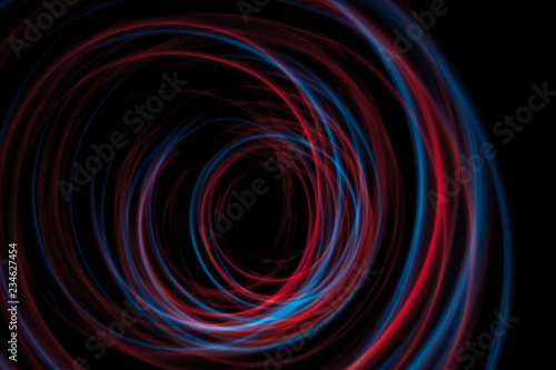 multicolor led light painting round trails abstract background on black