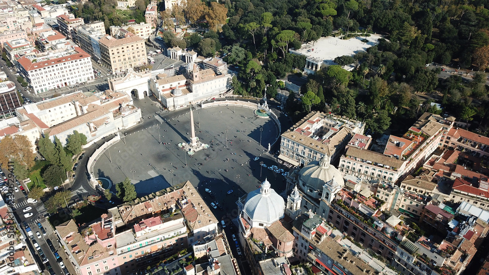Aerial drone view of iconic Piazza del Popolo (People's Square) named after the church of Santa Maria del Popolo in the heart of Rome, Italy
