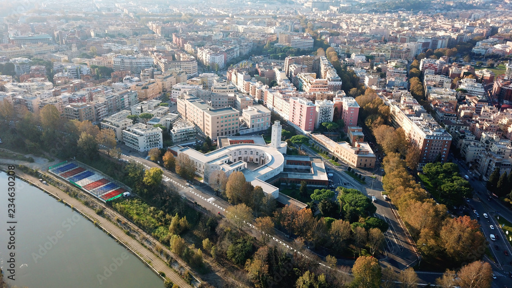 Aerial drone bird's eye view of iconic architecture in city of Rome next to river Tiber, Italy Aerial drone bird's eye view of iconic architecture in city of Rome next to river Tiber, Italy