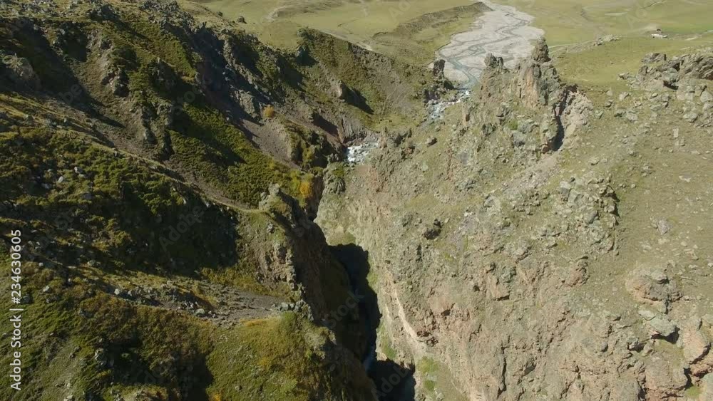 Aerial landscape view of the canyon river at Caucasus mountains near mount Elbrus - the highest peak in Europe Aerial landscape view of the canyon river at Caucasus mountains near mount Elbrus - the highest peak in Europe