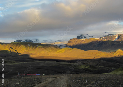 Stunning sunset with and Myrdalsjokull glacier, Katla caldera, Botnar-Ermstur, Laugavegur Trail, southern Iceland photo