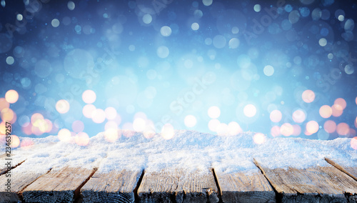 Winter Background  - Snowy Table With Christmas Lights In The Night
