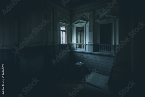 light from a window in abandoned building - dark mood style image