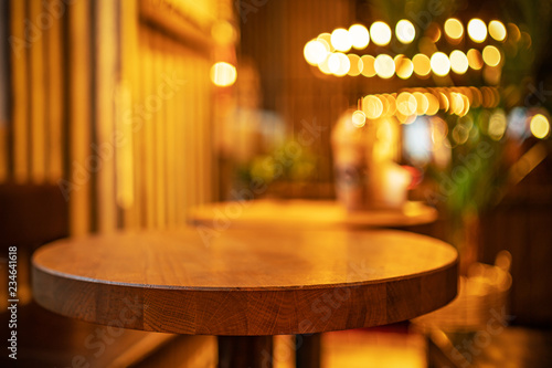 Photography Picture of cafe interior with wooden table and chairs