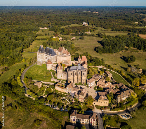 Aerial view, village and castle of Biron in the Dordogne region of south west France