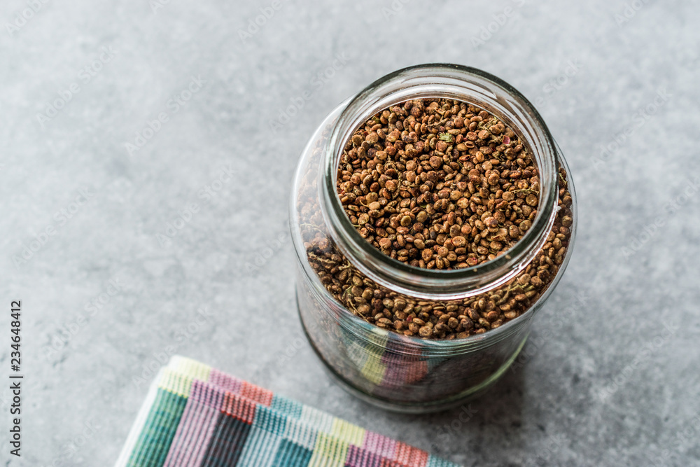 Jar of Sumac Seeds / Harvested Malosma Laurina Laurel Sumak Stock Photo
