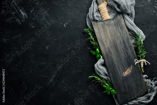 Foto Kitchen board and rosemary